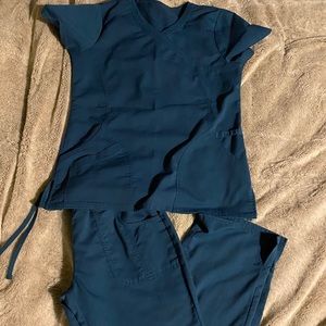 Dark teal color scrubs.